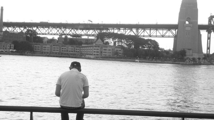 Sitting on the Rail looking out towards the Harbour Bridge 